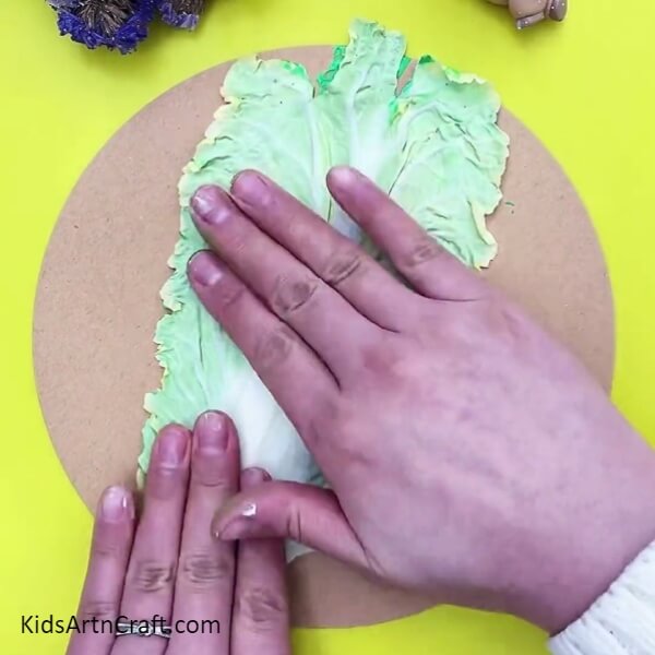 Place The Side Of The Painted Cabbage On The Paper To Get An Impression- Cabbage Prints Clay Art Tutorial for Novices 