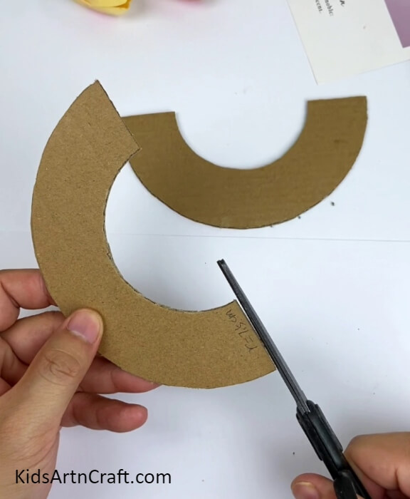 Cutting The Ring Into 2 Halves- Constructing an entertaining cardboard course for a ball and car game craft