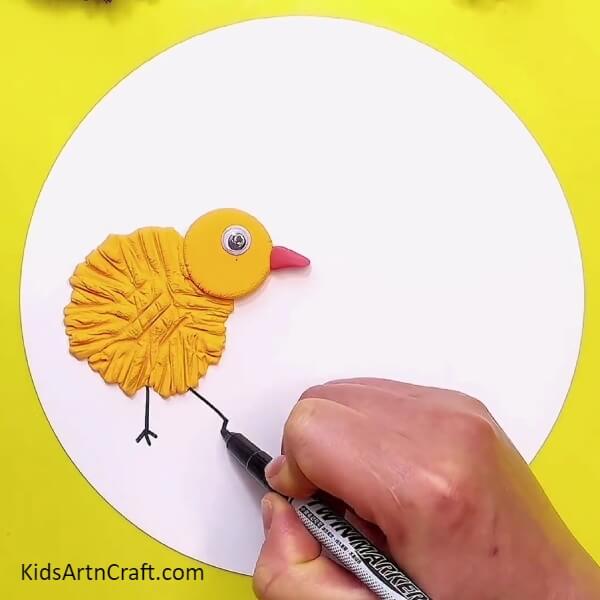 Drawing The Legs-Crafting Clay Chick Art with a Step-by-Step Tutorial