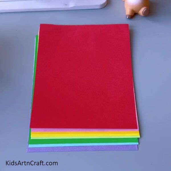 Taking colourful sheets- Complete tutorial to make colourful paper quarters for Kids