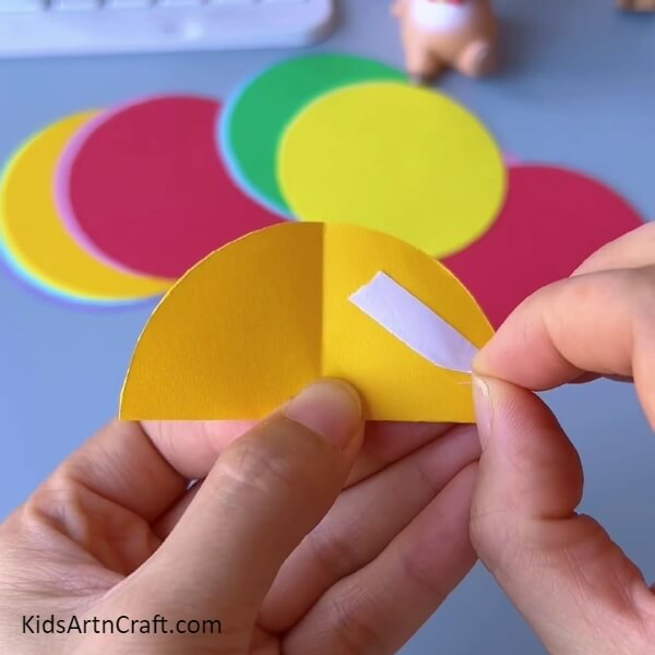 Creasing and applying double sided tape- Beginner tutorial on making a Colorful Paper Quarters 