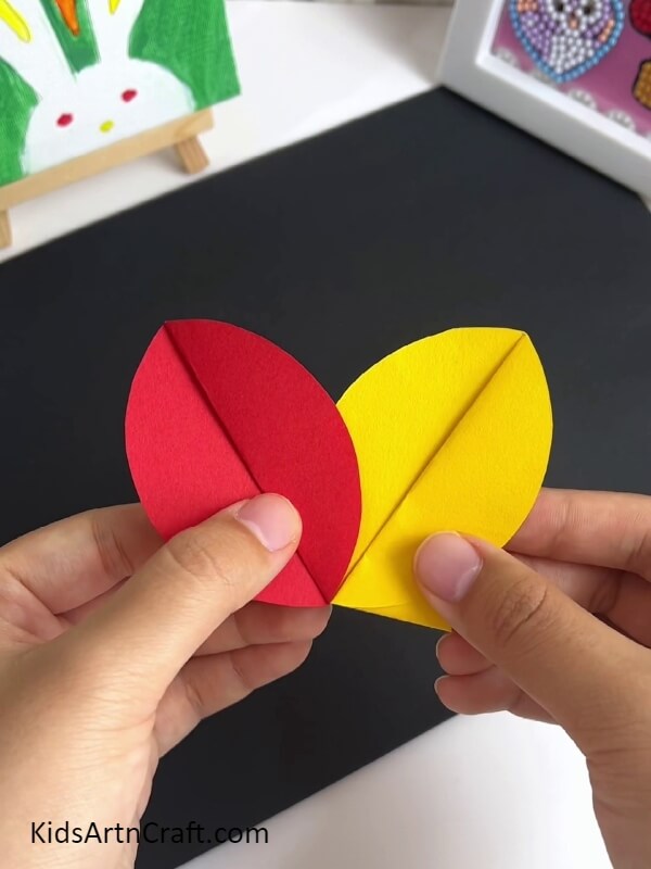 Putting Together The Petals-A project that uses colorful flowers to create a pinwheel shape for beginners 