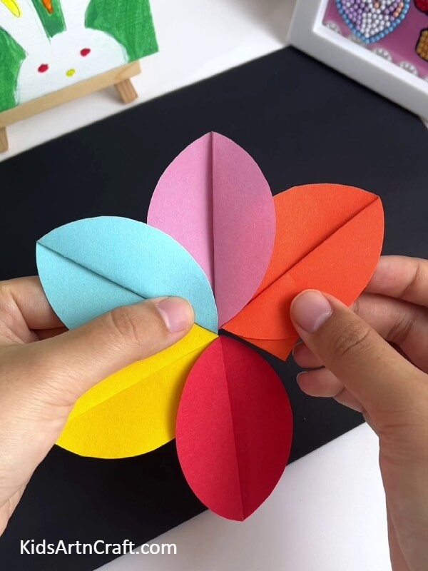 Completing The Petals-An introduction to the craft of making a pinwheel-like flower design for newbies 