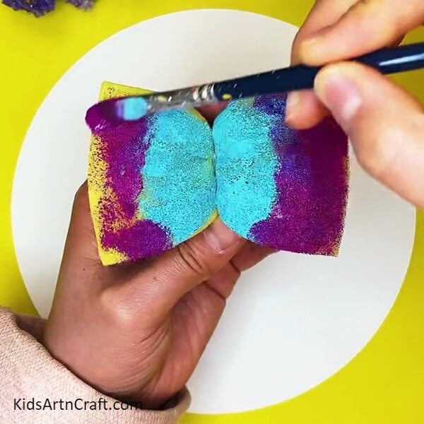 Colouring the other side of sponge. Creative Butterfly Painting Using Sponge Idea For children