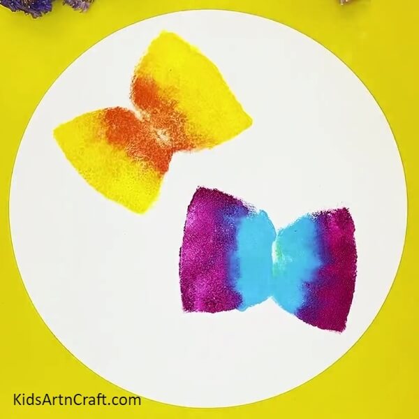 Painting stamps on sheet. step-by-step guide to paint Creative Butterfly Painting Using Sponge For children