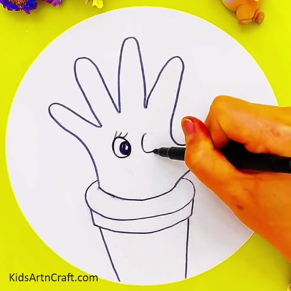 Drawing Cactus In A Pot- An original cactus drawing from a hand outline as an idea for children