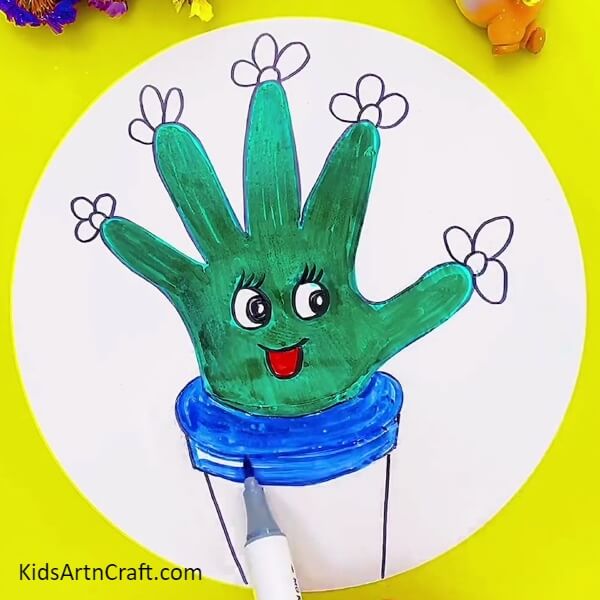 Coloring The Pot And Smile- A creative cactus sketch that can be constructed from a hand outline for youngsters