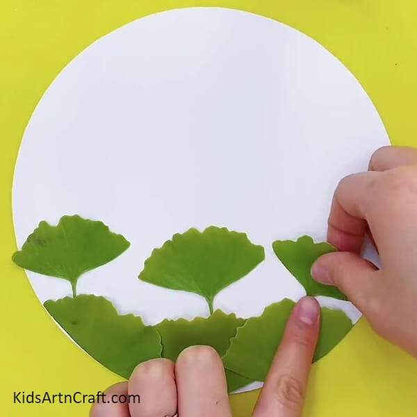 Pasting Leaves- A Fun Leaf Lotus Craft Activity for Toddlers