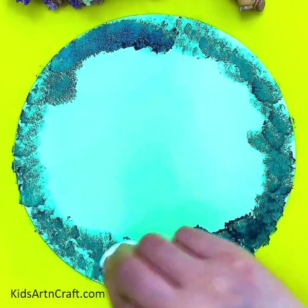 Filling the whole circle with color. Creative Forest Painting Art For Kids.
