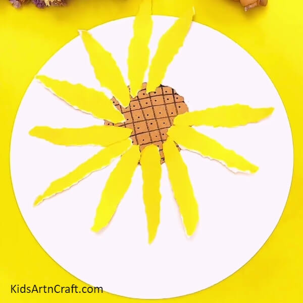 Completing Pasting One Layer Of Petals- A delightful sunflower paper craft thought for beginners 
