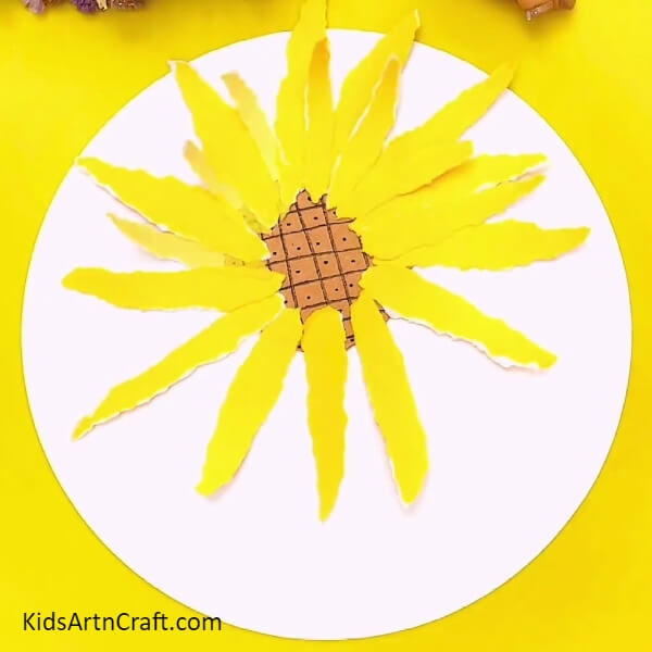 Making Another Layer Of Petals- An imaginative paper sunflower activity for those just starting out 