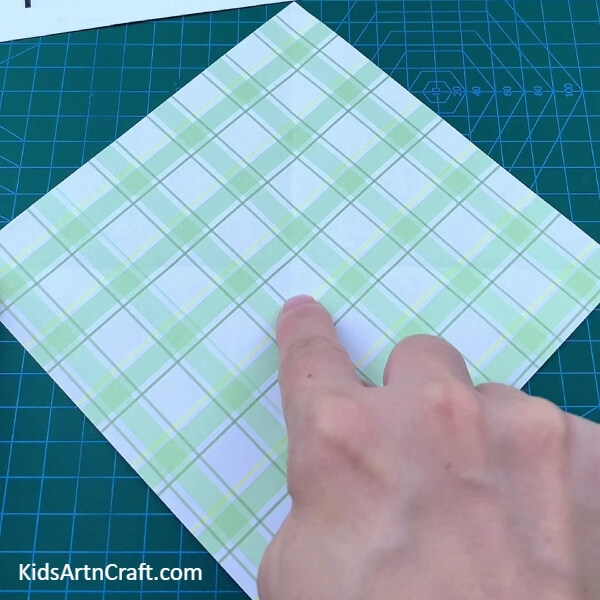 Making Creases-Making Mini Paper Origami Pouches For Children