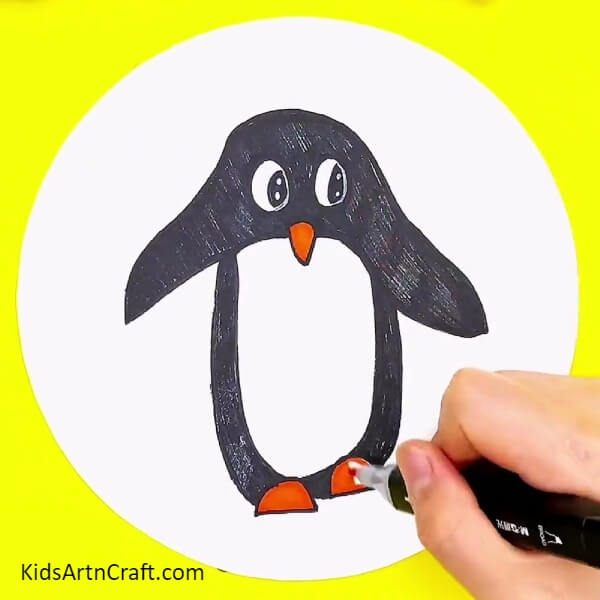 Coloring The Beak And Legs Of The Penguin-