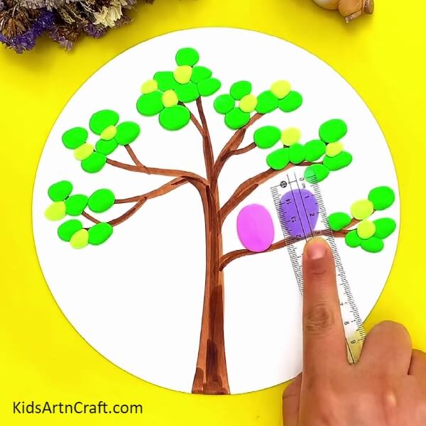Make An Oval Shape With Purple Clay-Crafting a Clay Bird Tree with Simple Steps for Children