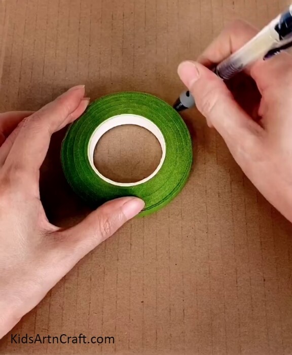 Outlining The Tape - Crafting a Home Decoration Out of Cardboard and Sticks Perfect For Kids