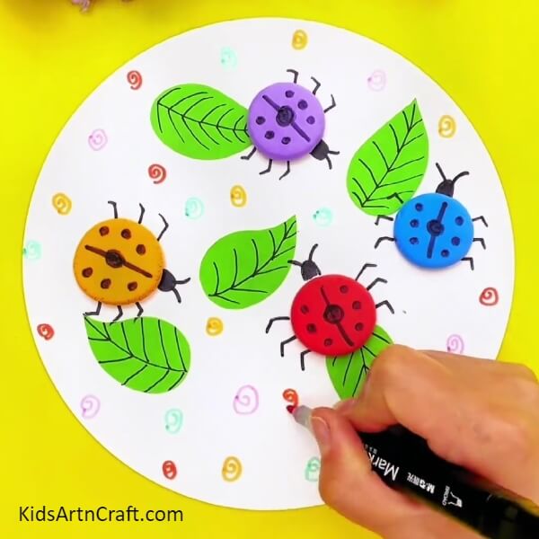 Decorating The Background-Clay Ladybugs