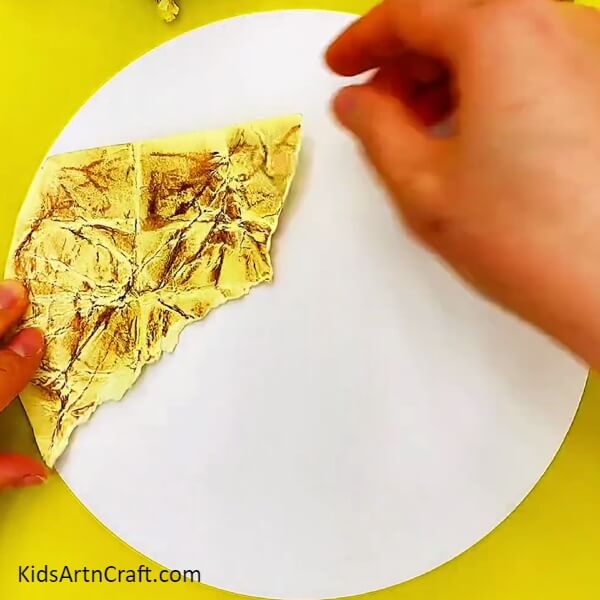 Place The Cut Pieces On The White Sheet-Making a DIY Ant Artwork with Scrunched Up Paper for Children
