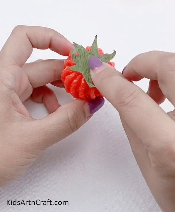 Placing The Leaf- How to Make Foam Strawberries by Yourself with a Step-by-Step Guide for Kids