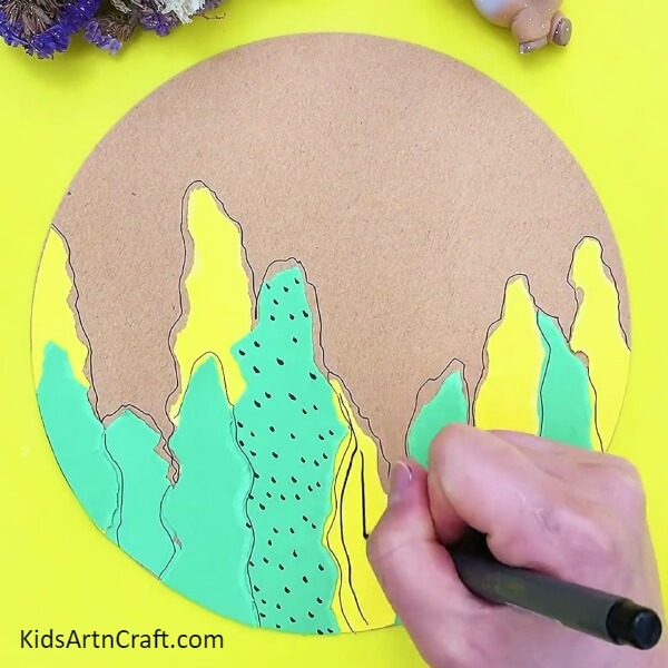 Outlining the plants. Ladybug And Plants Easy Artwork For Kids