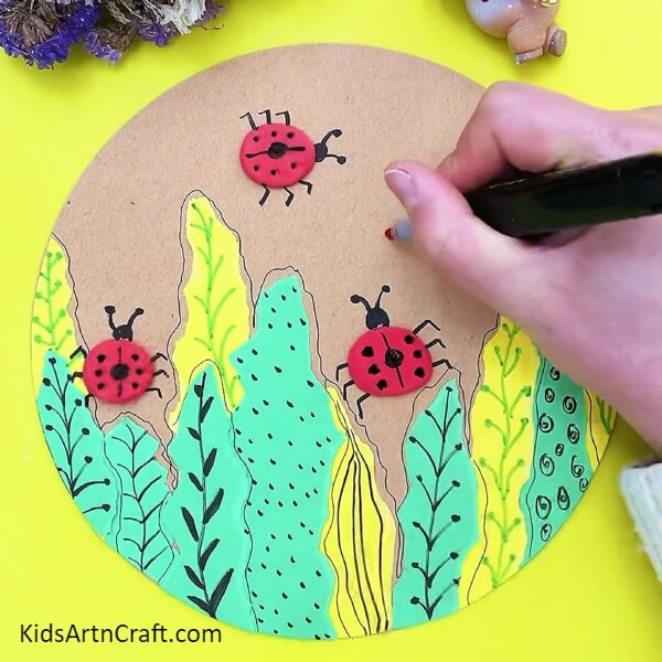 Decorating the base. Ladybug And Plants Easy Artwork For Kids