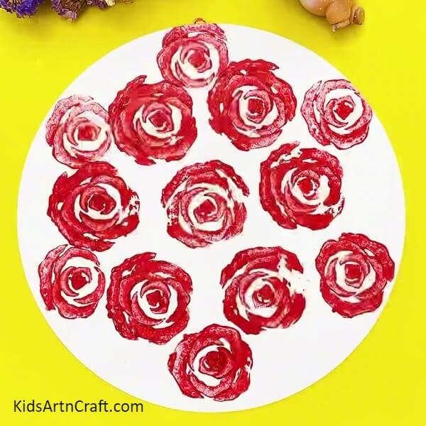Fill the whole white craft paper- How to Make a Lettuce-Stamped Rose Painting for Beginners