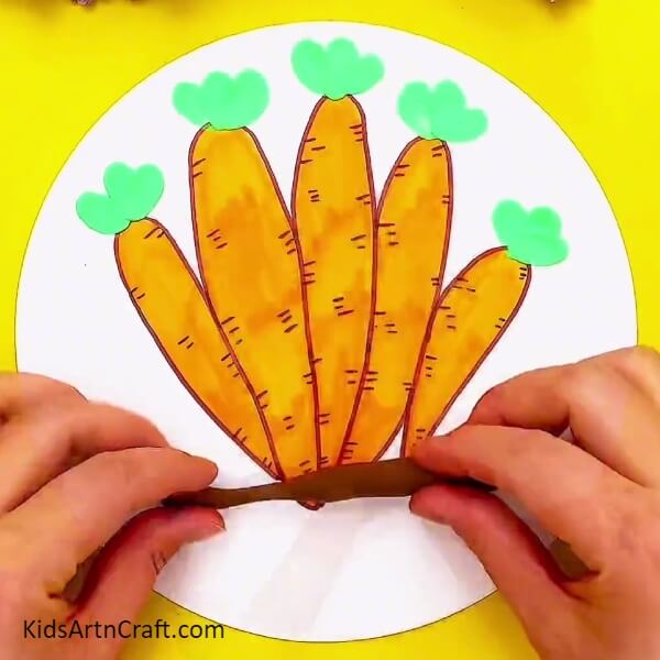 Design all leaves of the five carrots in a similar pattern- An Effortless Tutorial on Cultivating Carrots with Artistic Crafts