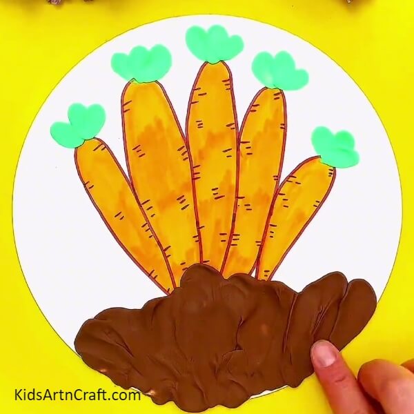 Make soil from the brown clay- A Guide to Growing Carrots with Artistic Crafts Easily