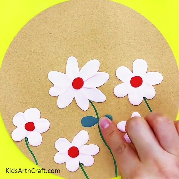 Make leaves with dark blue clay- Introductory Clay Garden Art for the Beginner 