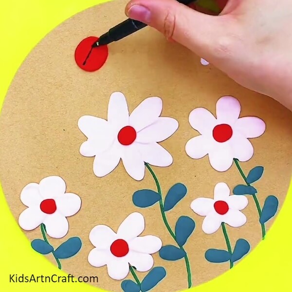 Make red circle with red clay- A Simple Clay Flower Garden Project for Beginners 