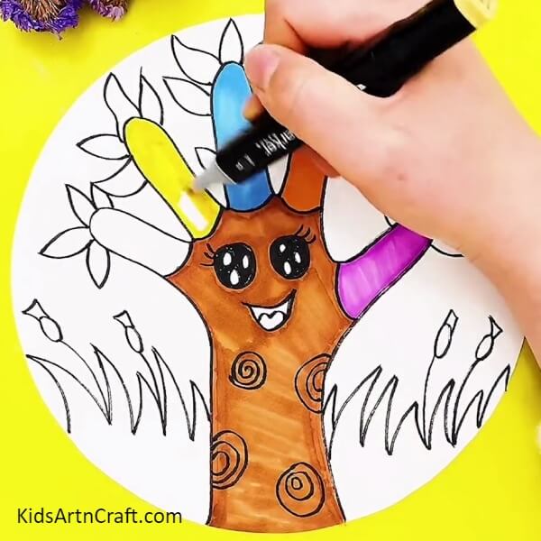 Coloring Tree Branches Using Different Color Sketch Pens-Offering an uncomplicated tree outline for children