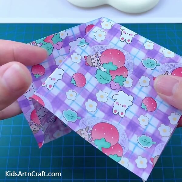 Folding Along The Creases-Follow this guide to make your own mini origami paper holder