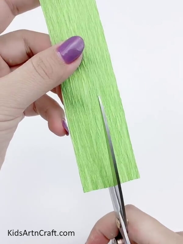Cutting Out A Crepe Paper Strip - A Simple Wheat Artwork Making Use Of Crepe Paper For Newbies 