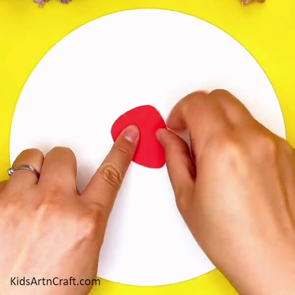 Pasting Strawberry Cutouts- A Guide on How to Make Strawberries with Children 