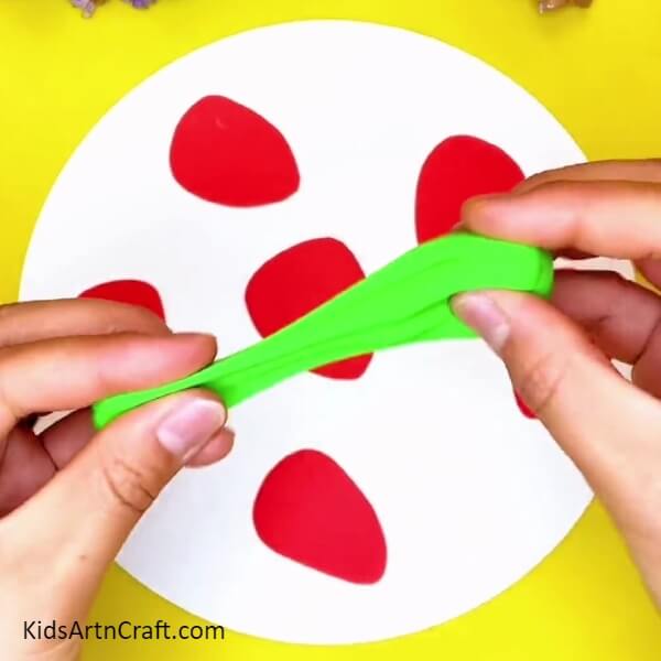 Taking Out A Piece Of Green Clay- Detailed Instructions for Making Strawberries with Kids 