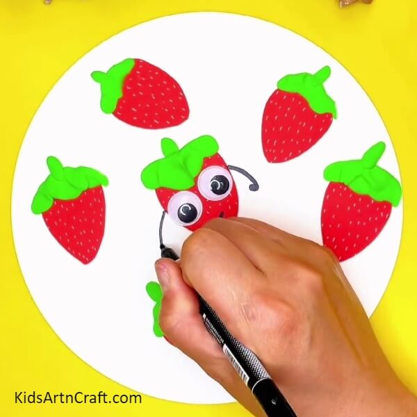 Drawing Hands- Detailed Directions for Crafting Strawberries with Youngsters 