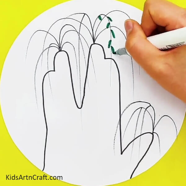 Making Leaves Over The Finger Branches- Guide for kids to make a hand-shaped tree sketch step-by-step