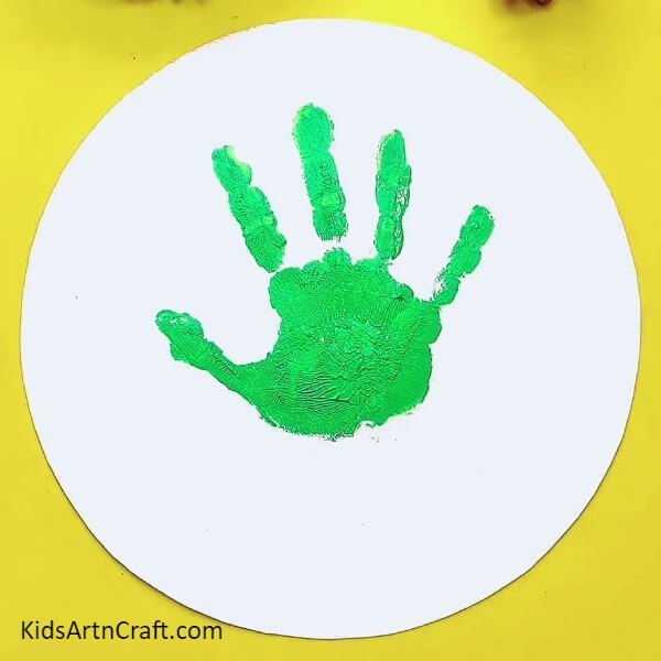 Tiny Little Hand Print- A guide to creating a handprint flowerpot using paints