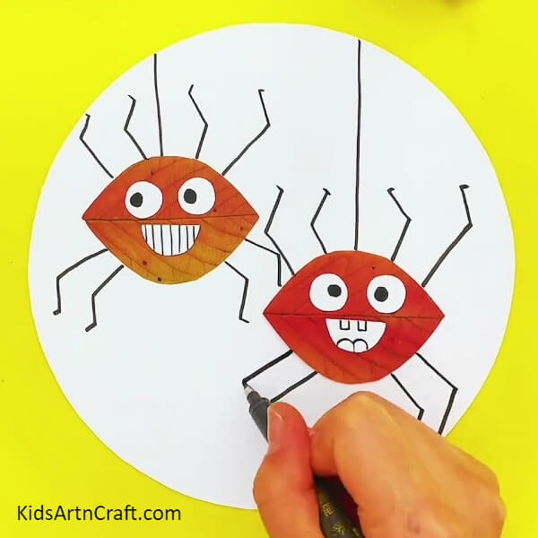 Drawing Legs Of The Second Spider - Spiders from Leaves Creative Kids Craft