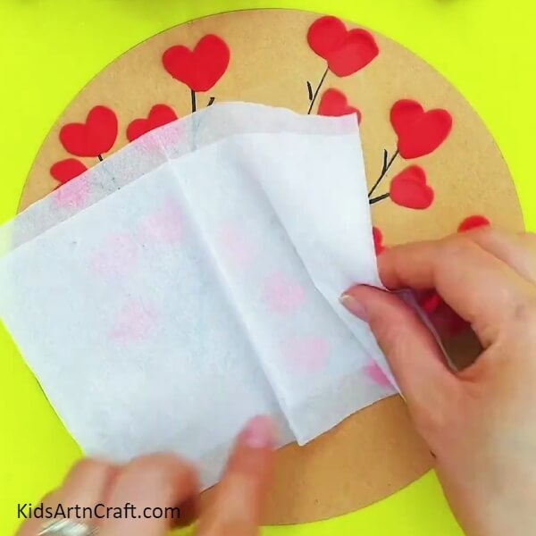 Working With The Tissue Paper-A creative activity for kids using clay, paper, and hearts to make a bouquet