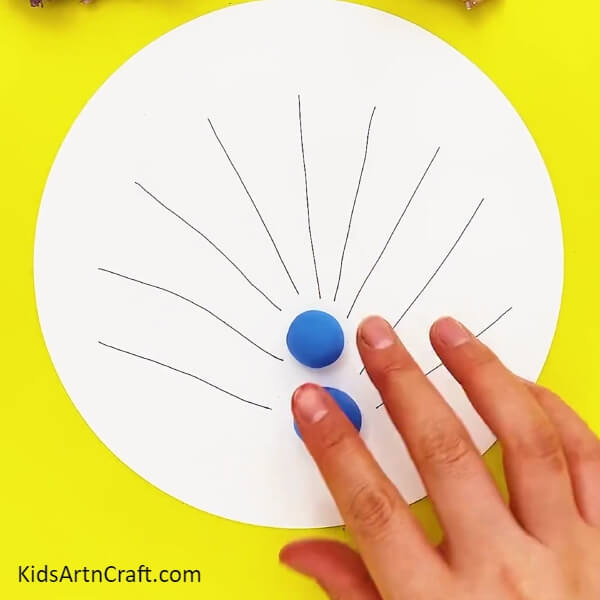 Let's Start With Some Blue-Instructions on creating a clay peacock for children