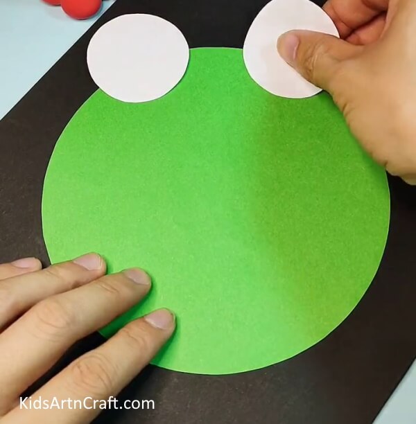 Pasting Eye Balls-to Make Easy Paper Frog