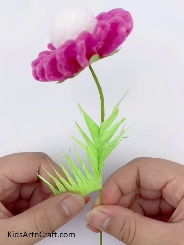 Wrap The Grass Around The Stem Of The Flower- Making Flowers Out of Fruit Foam Covers - A Fun Activity For Children 