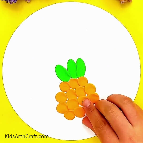 Pasting More Yellow Clay Circles- Constructing Pineapples With Colored Clay - An Awesome Idea! 