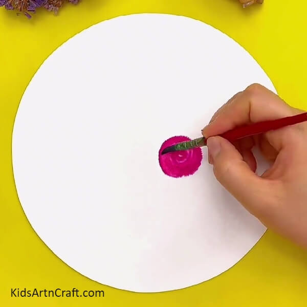 Painting The Spiral With Water-To Make Snails