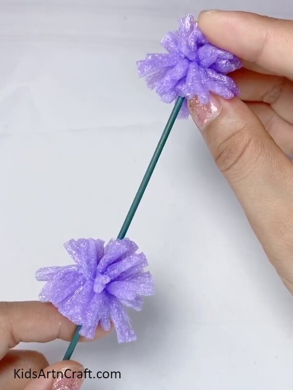 Putting The Pom Poms Inside A Floral Stem- Constructing Your Own Lavender Bouquet with Fruit Foam Pom Poms 