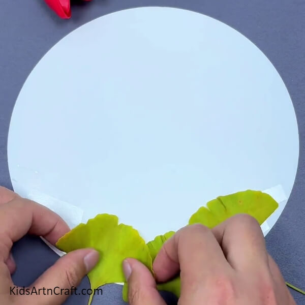 Sticking More Broad Leaves-Teaching kids how to make a leafy panorama