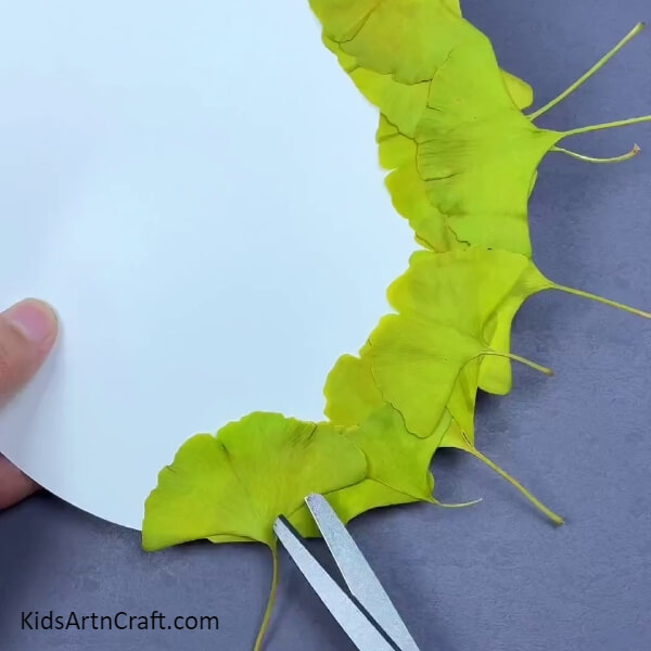 Sticking All The Broad Leaves-Showing kids how to make a leafy landscape