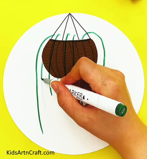 Make Stems With Green Marker/sketch Pen-Cultivate the knack to design a hanging flora art work for youngsters