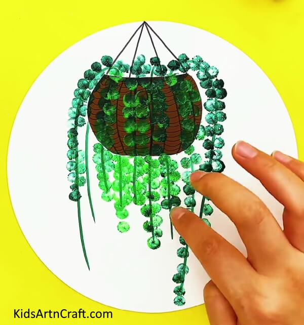 Make Prints With Dark Green Poster Colour-Acquire the technique of making a dangling botanical artwork for small children