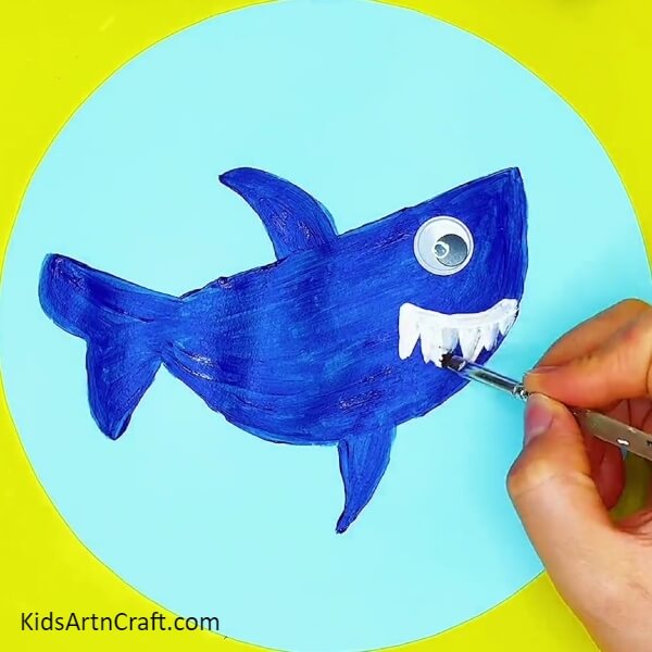 Make teeth with white poster colour- Learn The Process Of Making Shark Art Step-by-Step Tutorial